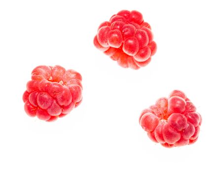 Juicy red berry raspberries on a white background