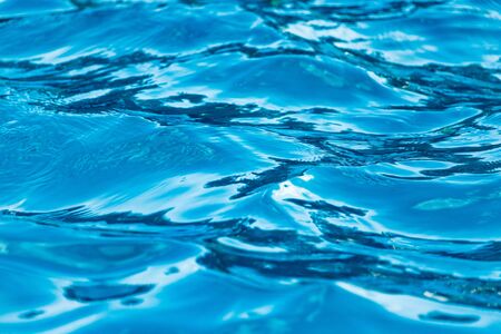The smooth water in the pool as a background .の写真素材