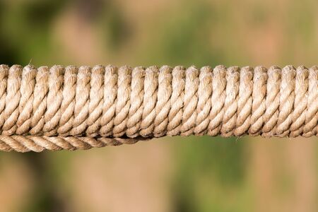 Rope twisted on the post as a background