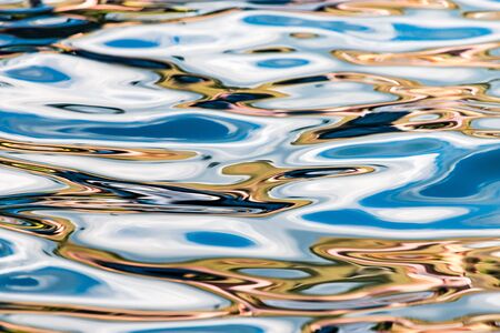 The smooth water in the pool as a background .
