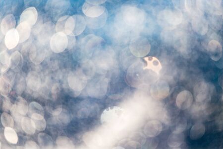 Abstract background of bokeh water in pool .