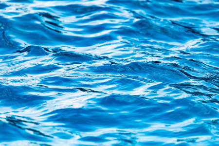 The smooth water in the pool as a background .の写真素材