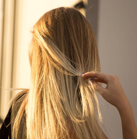 Long hair on the head of a blonde .の写真素材