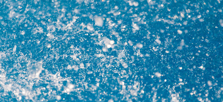 Abstract background of running blue water. texture