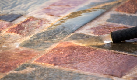 Water from a hose on a granite .の写真素材