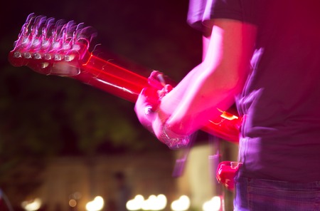 Musician playing guitar in a rock band .の写真素材