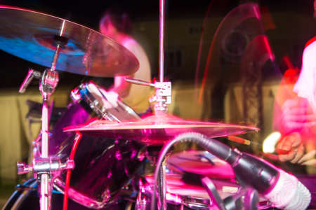 Musician plays drums in a rock band .の写真素材