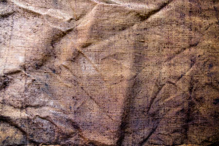 Old smoked burlap as an abstract backgroundの写真素材