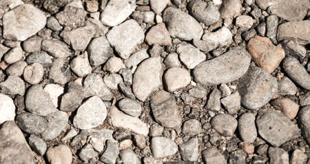 Round stones on nature as an abstract background