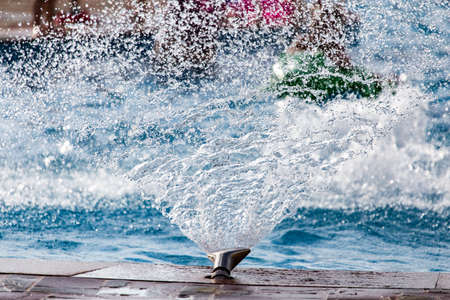 Splashing water in the pool as a background .