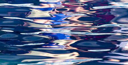 The smooth water in the pool as a background .の写真素材