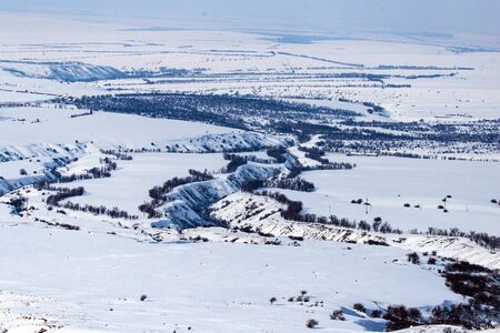 White snow in the steppes of Kazakhstan as a background .