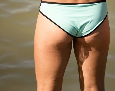 Pop girls in a swimsuit on the beachの写真素材