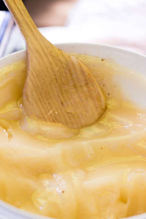 the beekeeper sells honey in the marketの写真素材