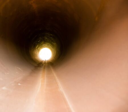 large rusty metal pipes as a backgroundの写真素材