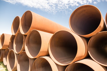 large rusty metal pipes as a background