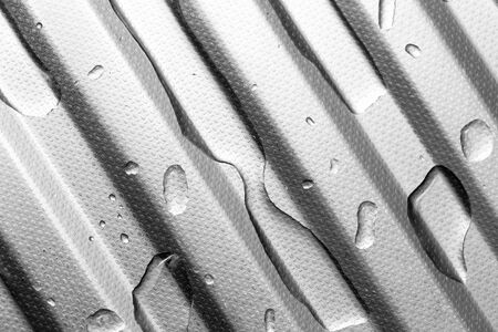 Water on metal surface as backgroundの写真素材