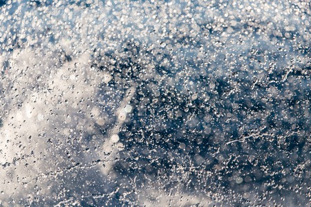Abstract background of drops of water on the flyの写真素材