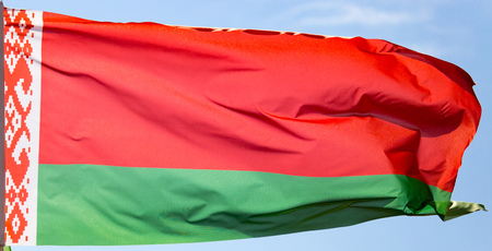 Flag of Belarus against the blue skyの写真素材