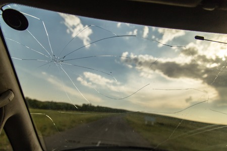 crack on the auto glass as a background