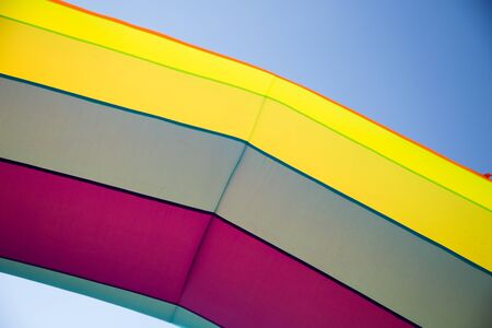 Multicolored inflatable balloon on the sky background .の写真素材