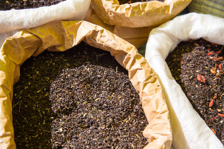 dry tea leaves on the market as a background .の写真素材