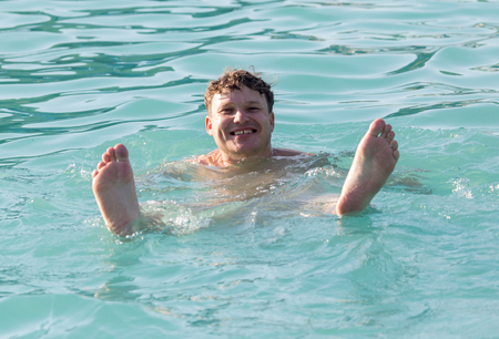 man bathes in the water park
