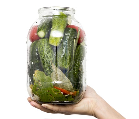 Preservation of tomatoes with cucumbers in cans .の写真素材