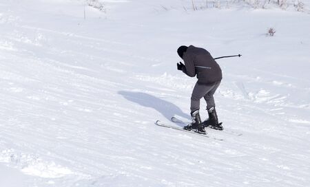 Man skiing in the snow in winter .の写真素材