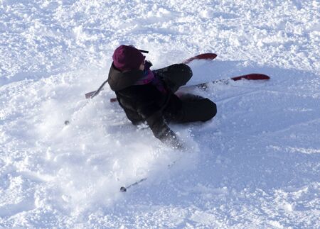 Girl skiing in the snow in winter .の写真素材