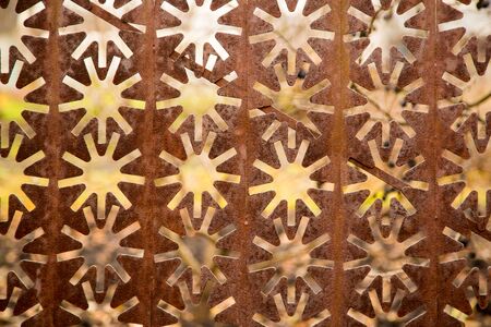 Decorative metal fence with stars as backgroundの写真素材