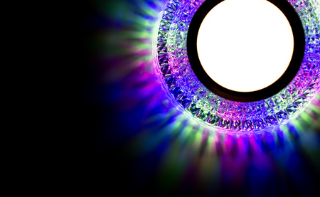 a lamp on a stretch ceiling in a room