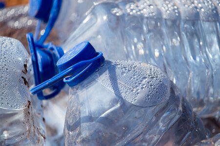 Blue plastic water bottle in the nature .の写真素材