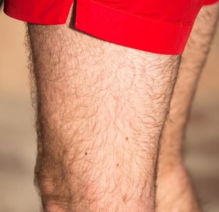 Hair on the legs of a man .の写真素材