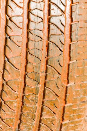 Tires from the car painted with paint as a background .の写真素材