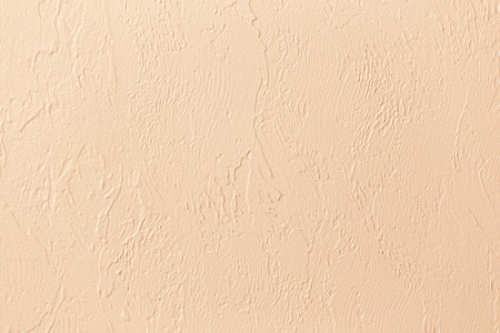 Decorative plaster on the wall as a background .