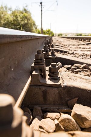 Old rusty metal sleepers on the railway .の写真素材
