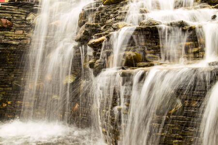 Waterfall in the park as a background .の写真素材