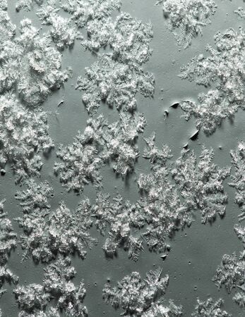 Snowflakes on a gray background. Abstract textureの写真素材