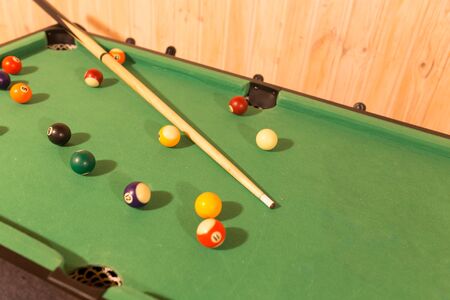Board game with balls and cue billiards .