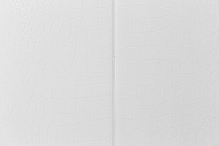 White tile in the bathroom as a background .