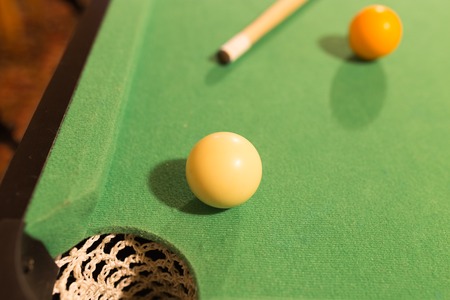 Board game with balls and cue billiards .