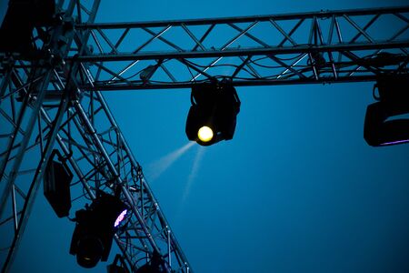 Color searchlight at a concert at night .の写真素材