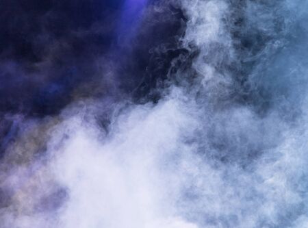 Multi-colored smoke at the concert at night .の写真素材