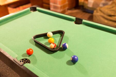 Board game with balls and cue billiards .