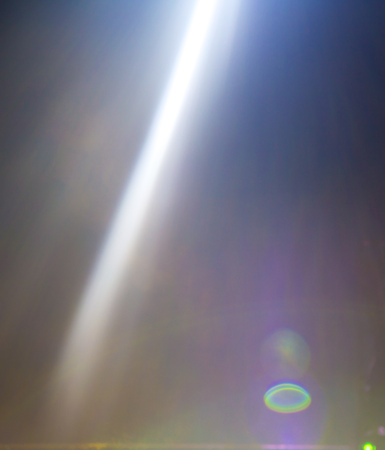 Color searchlight at a concert at night .の写真素材