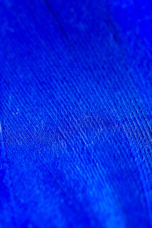 A blue feather as an abstract background. Macroの写真素材