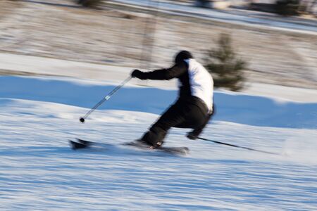 A man skiing in a ski resort .の写真素材