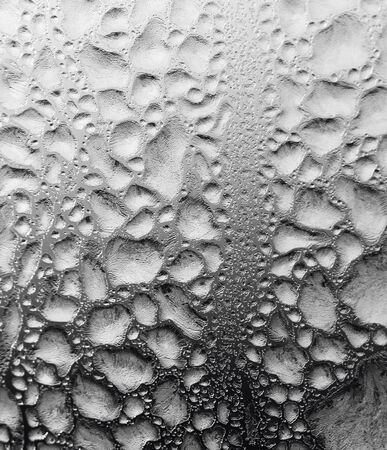 Black and white drawings on the glass in the frost .の写真素材