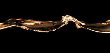 Water smooth with splashes on a black background .の写真素材